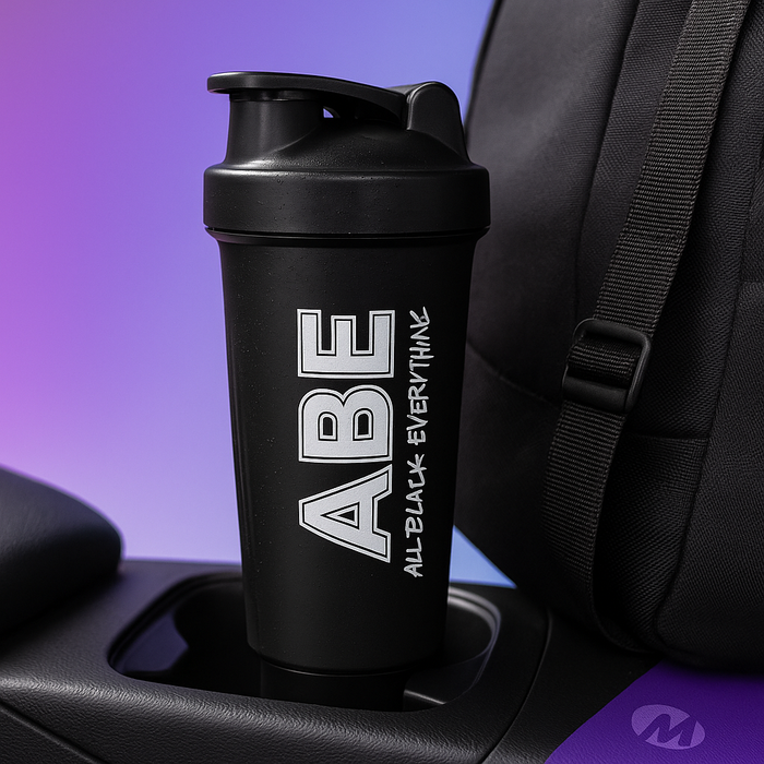 The ABE shaker in a car cupholder, or clipped to a gym backpack, ready for a busy day