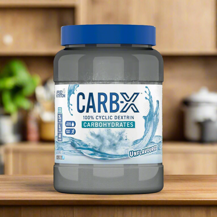 Gray tub of Applied Nutrition Carb X with blue lid, unflavored branched cyclic dextrin