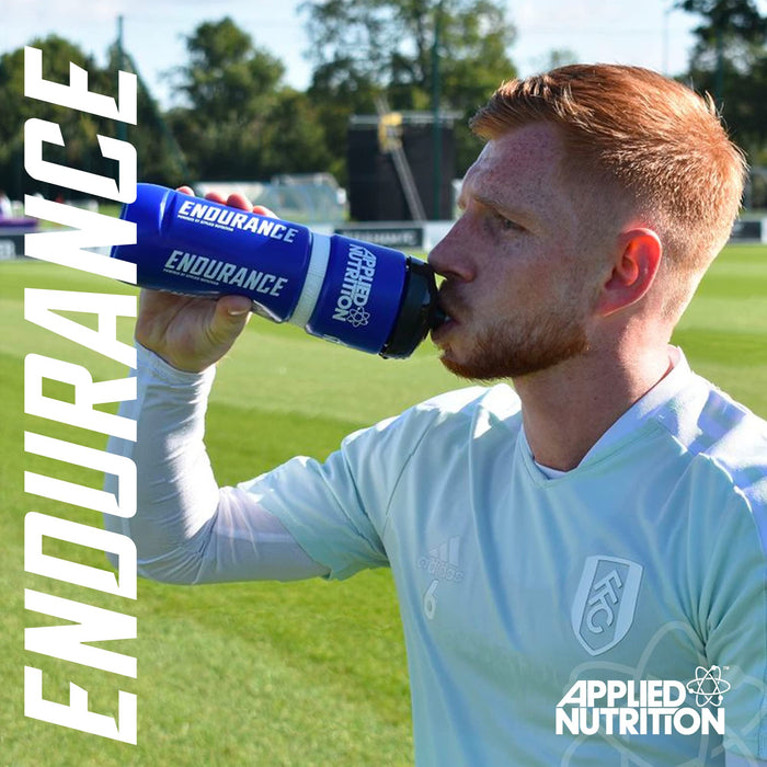 Man drinking from a blue and white water bottle with Applied Nutrition Endurance Carb Electrolyte Energy