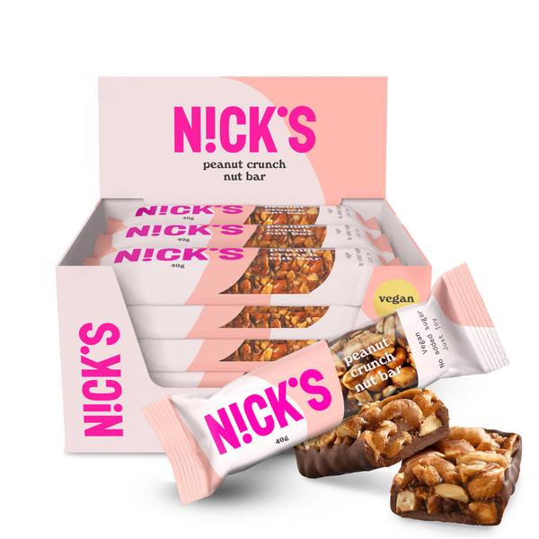 Nick’s Nut Bar display with vegan nut bars, showing chunky peanut and cocoa butter coating