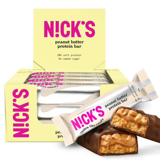 Display of NICKS Protein Bar with Salted Caramel and Milk Chocolate, broken in half